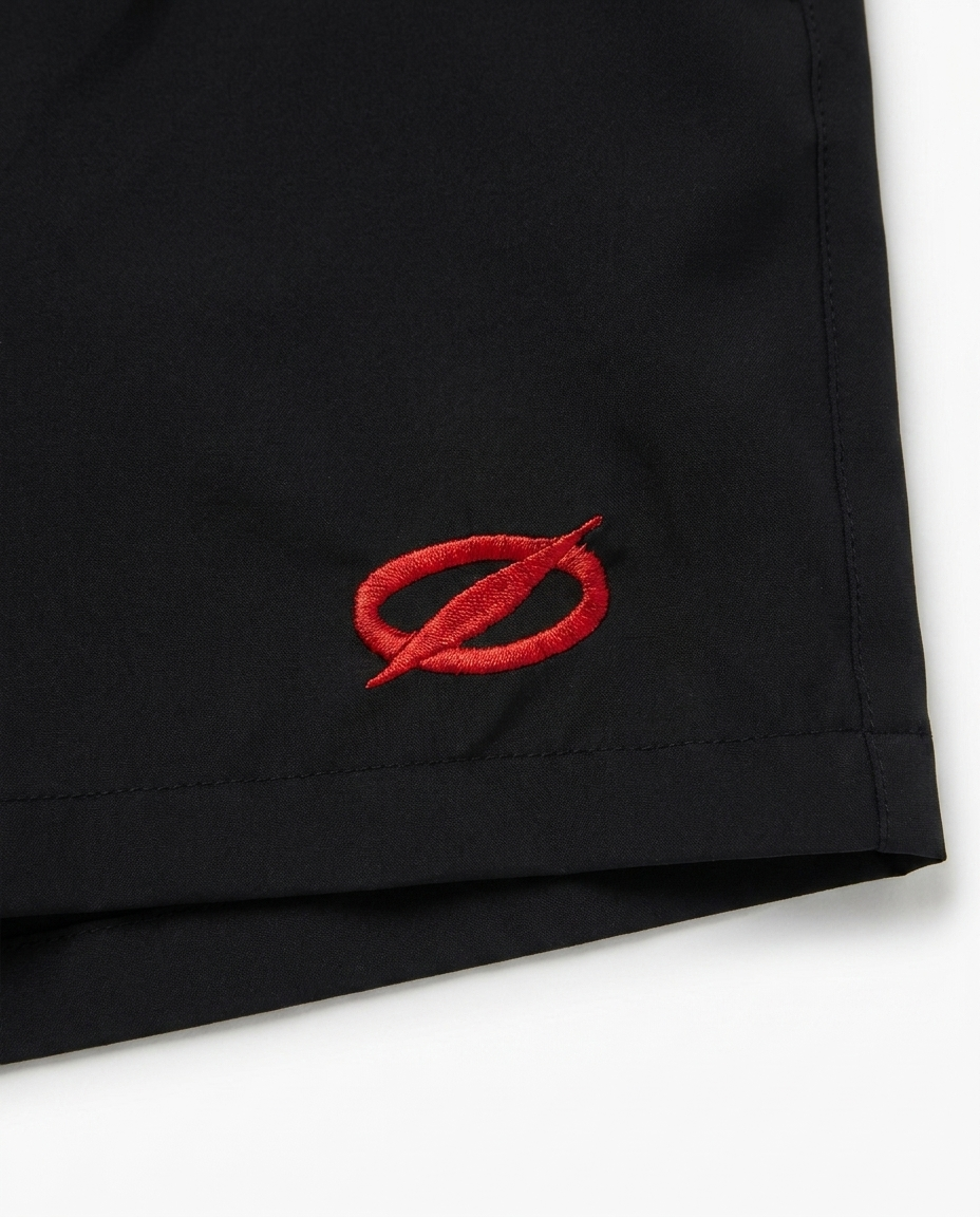 Canis Major Swim Shorts — logo detail